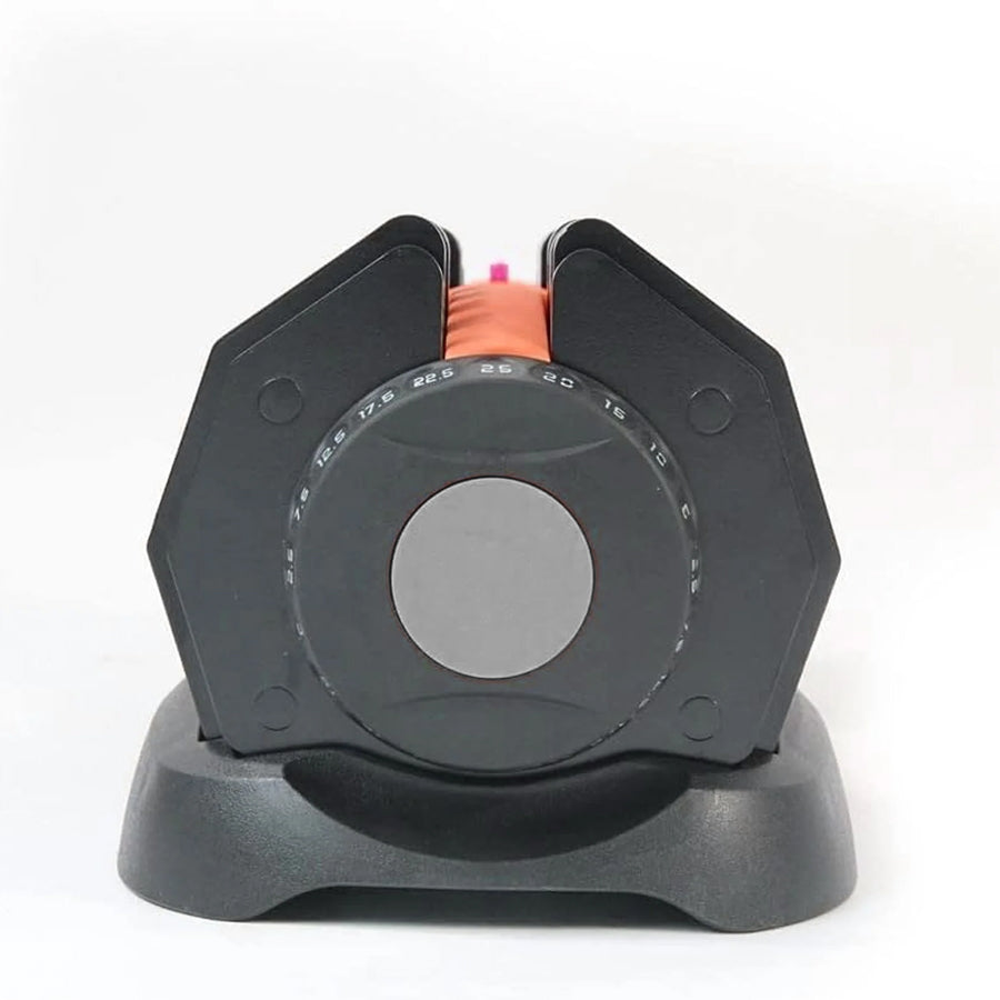 Black and gray tool with measurement markings on a white background