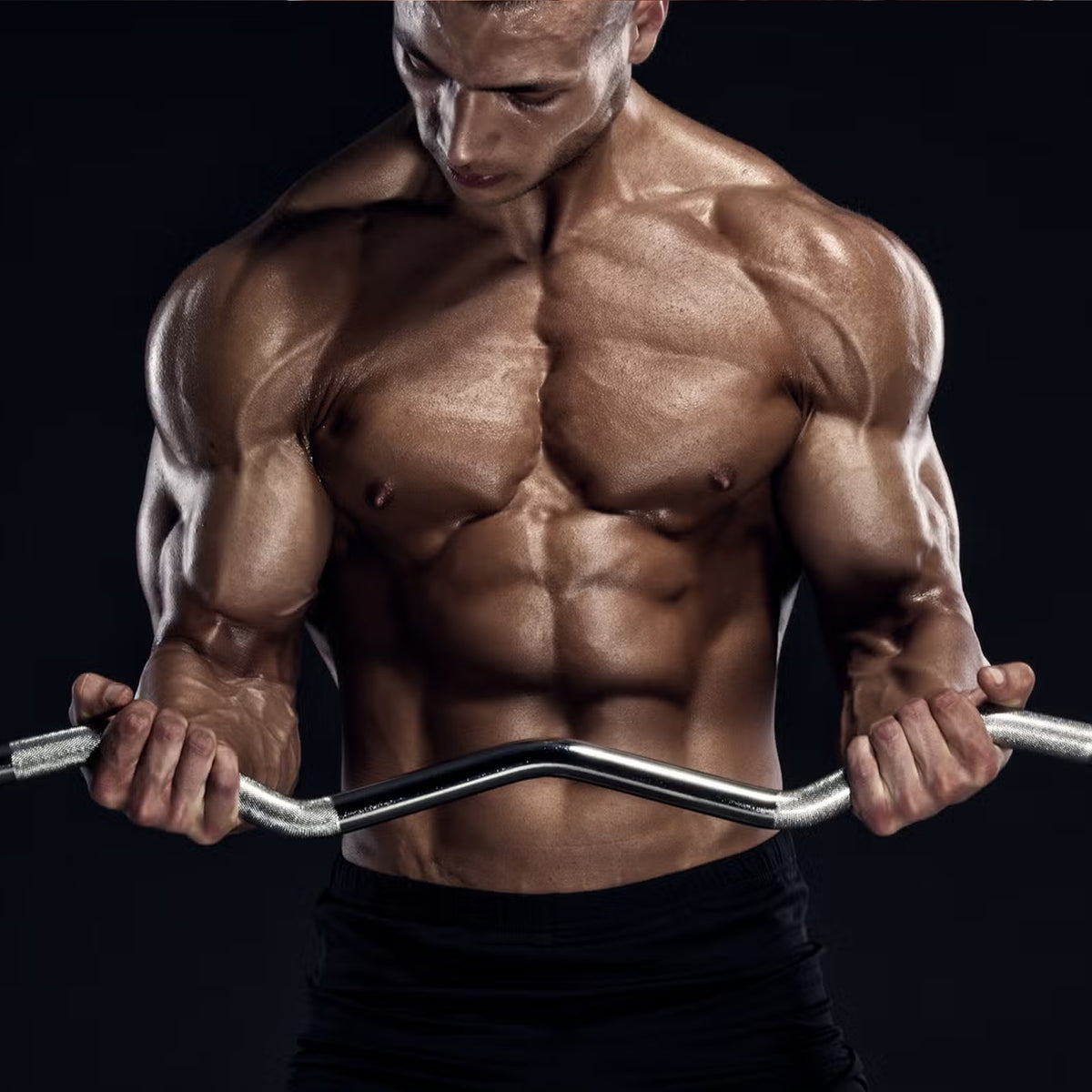 Athlete curling the EZ curl bar using its angled grip