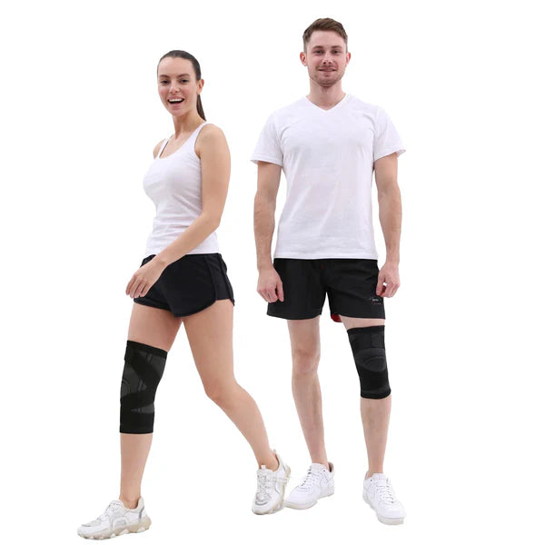 Two people wearing black knee braces on a white background
