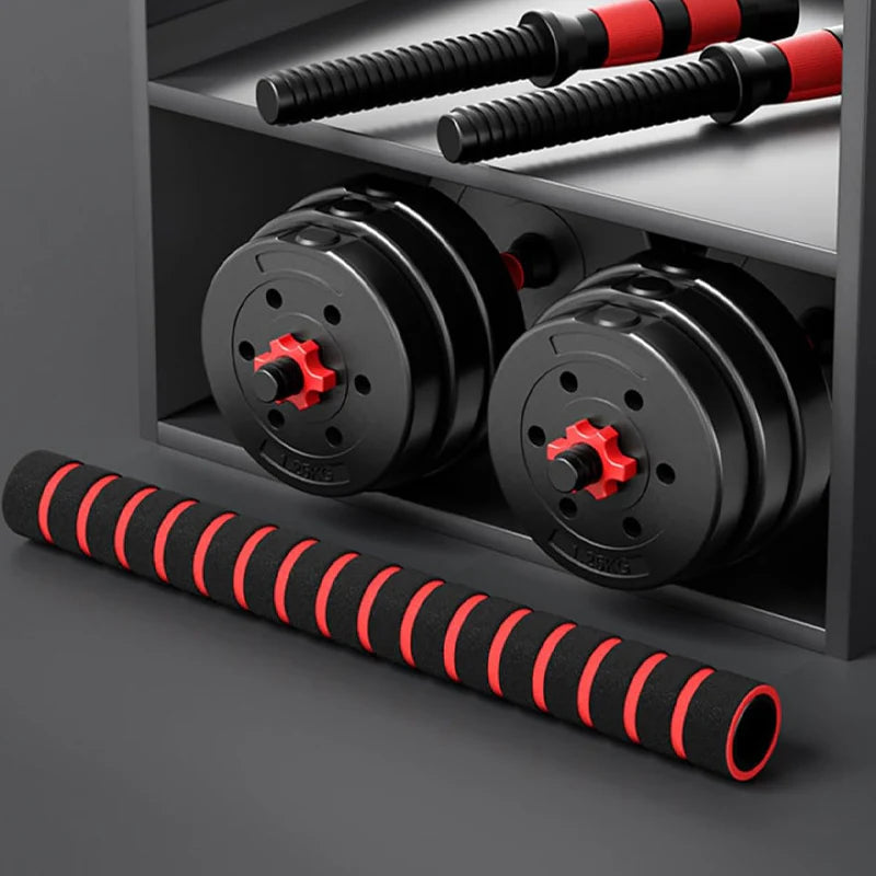 Black and red dumbbells on a gray surface with a dark background