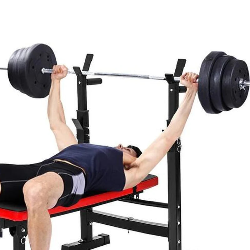 Person lifting weights on a weight bench with a white background