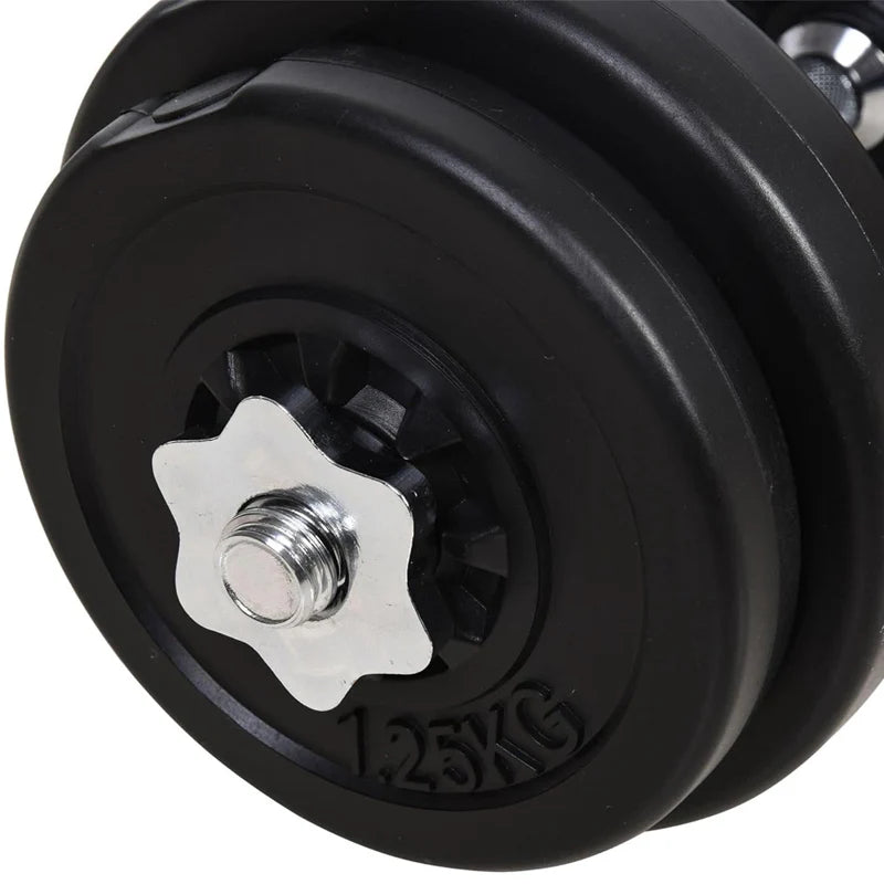 Close-up of a black dumbbell with a silver adjusting knob on a white background