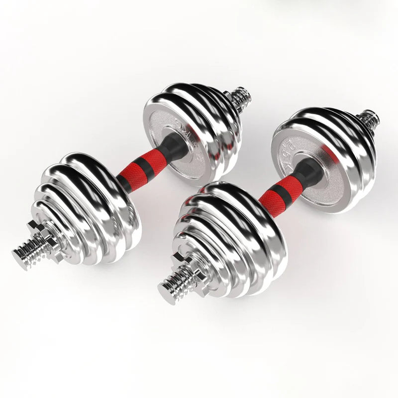 Pair of chrome dumbbells with red and black resistance bands on a white background