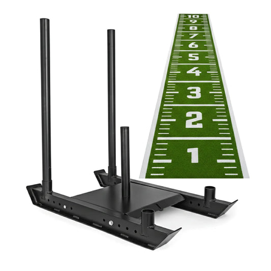 Black push-pull sled with upright posts and a measuring tape for scale on a white background