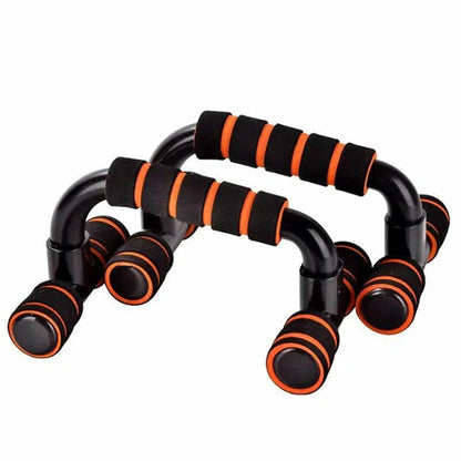 Black and orange exercise handles on a white background