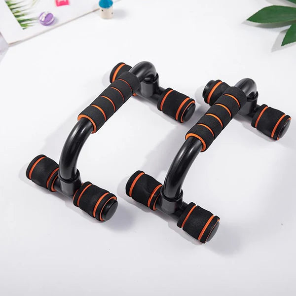 Black and orange exercise handles on a white background