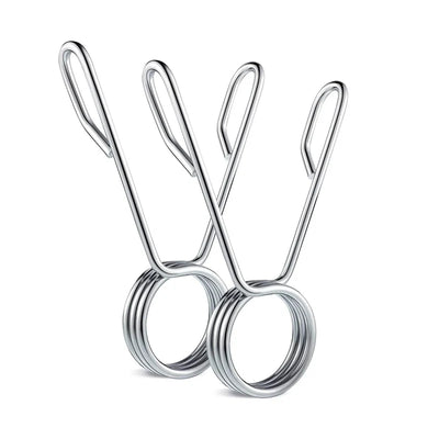 Metallic scissors on a white background