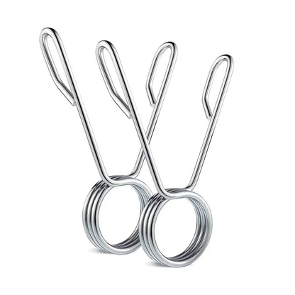 Pair of Olympic 2 inch spring barbell collars on a white background