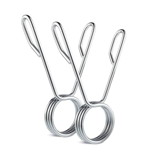 Pair of Olympic 2 inch spring barbell collars on a white background
