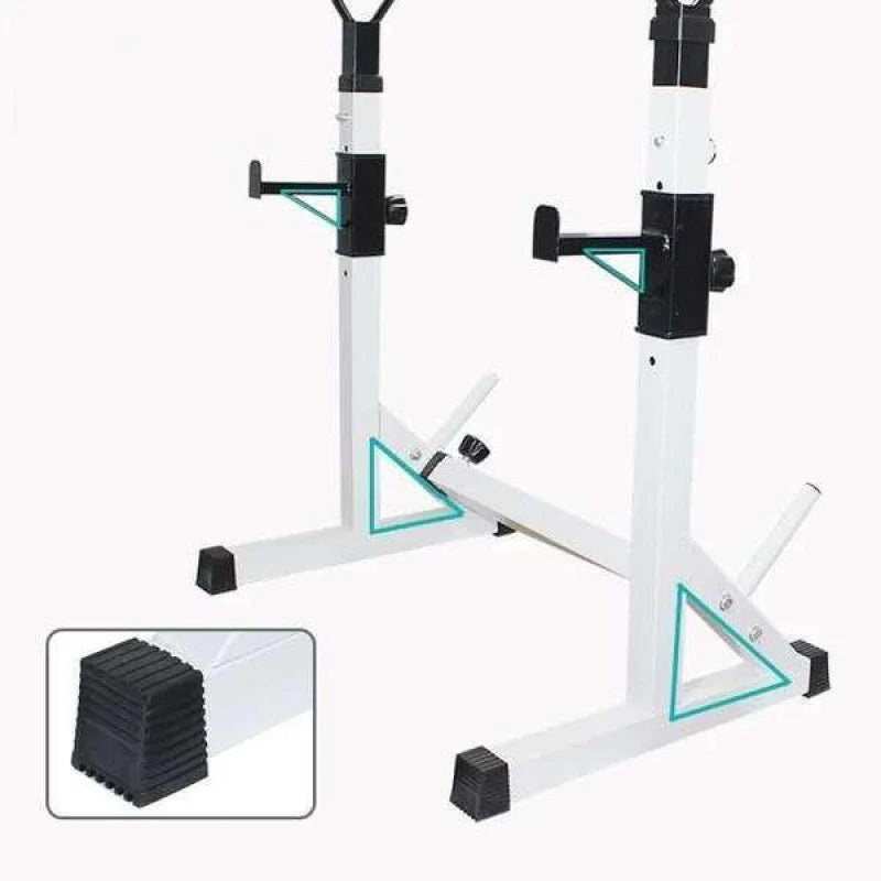 White and black adjustable weight bench with black weight plates on a white background