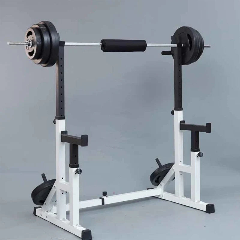 White weight rack with barbell and weights on a gray background