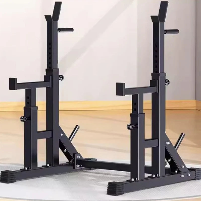 Black metal squat rack on a wooden floor with a neutral background