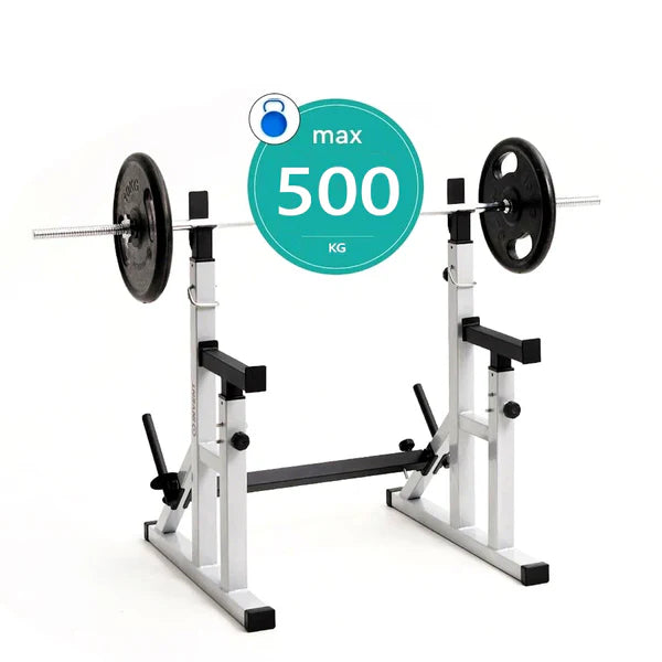 Weightlifting bench with barbell and weight plates on a white background