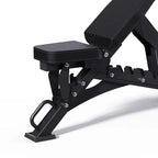 Black adjustable weight bench on a white background