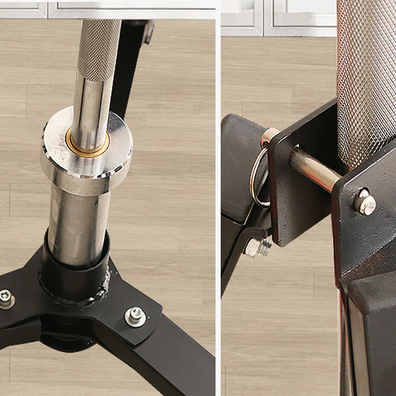 Close-up of a chair's metal support and mesh backrest on a wooden floor.