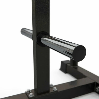 Black metal squat rack with chrome bar on a white background