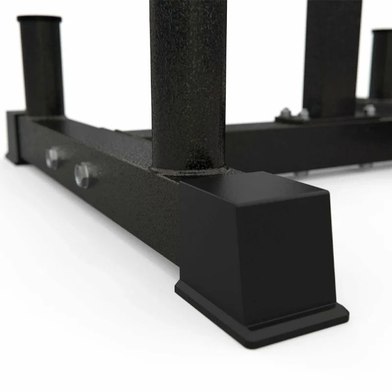 Black metal squat rack on a white background