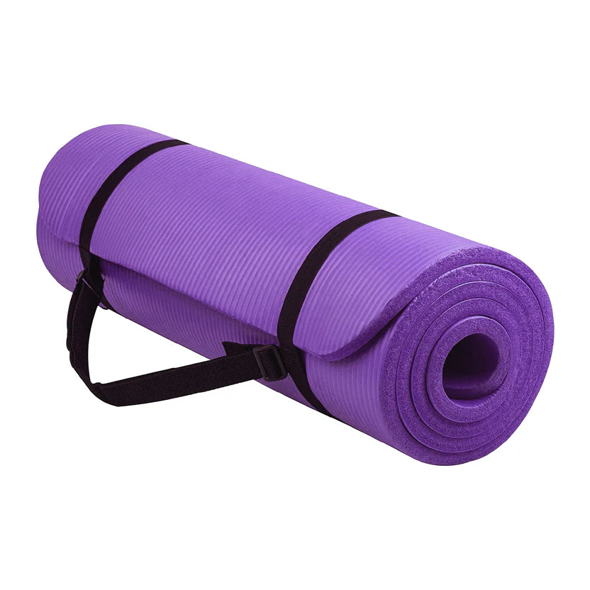 Purple yoga mat with a black strap on a white background