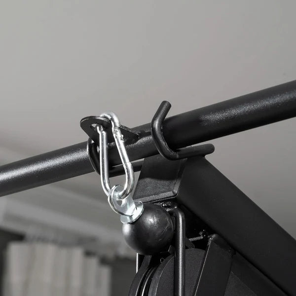Metal hook attached to a black metal bar with a blurred background