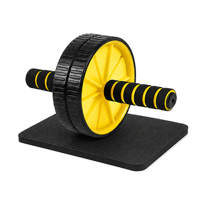 Dual-wheel ab roller, yellow, with foam handles on a black knee mat, on a white background